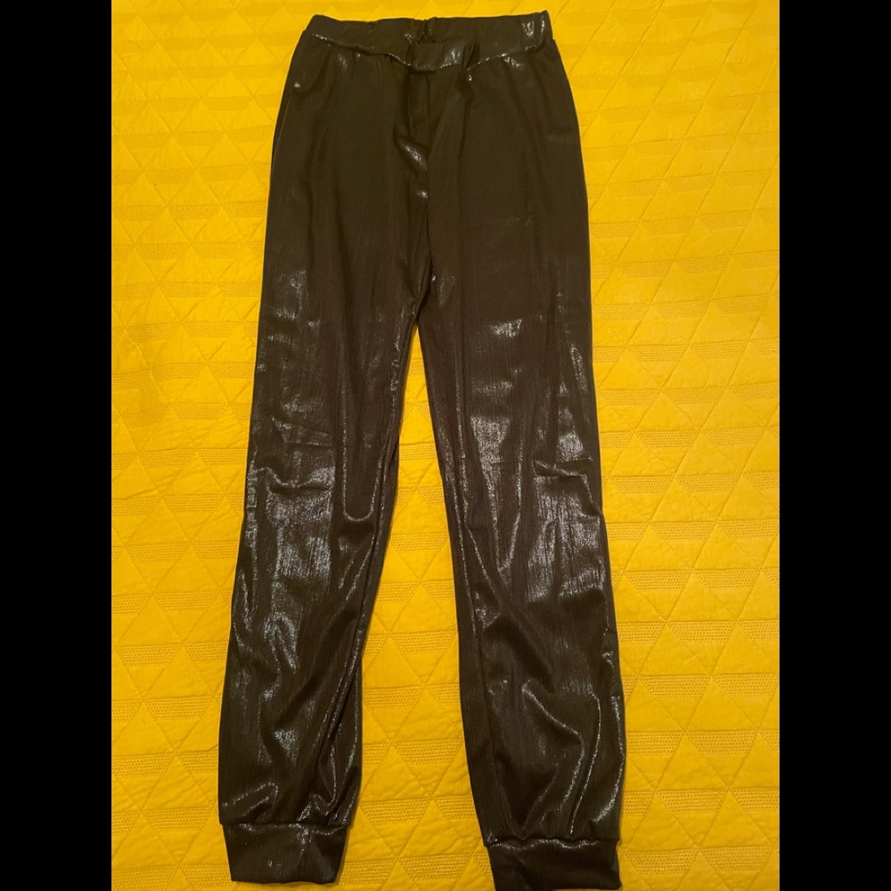 Black Jogger pant. Shiny in color and made of stretchy material